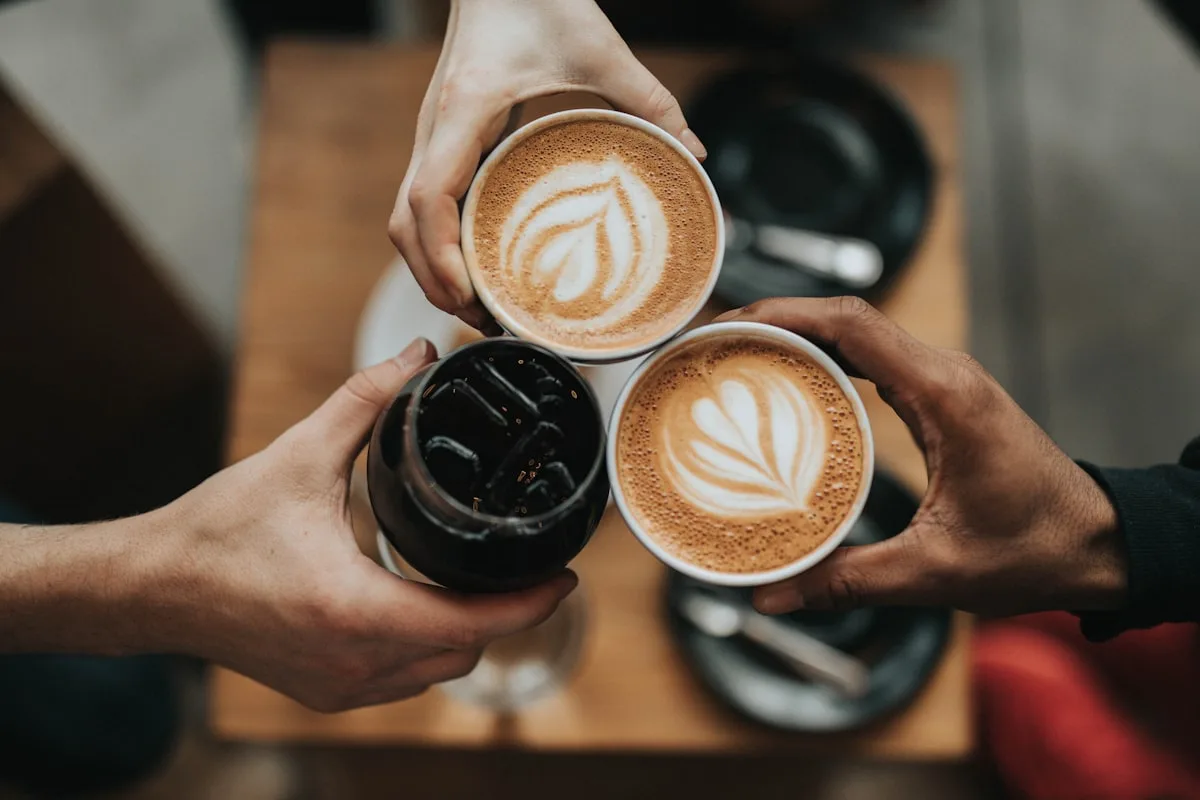 The coffee shop social ritual — why people keep buying out despite the math